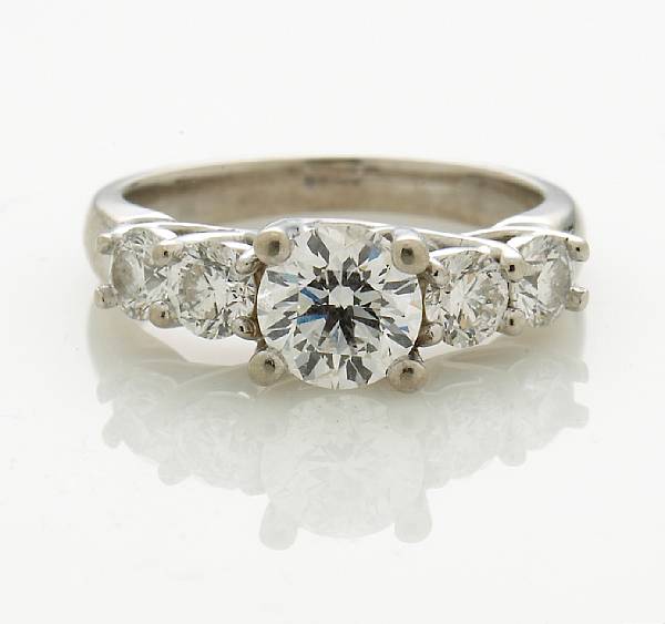 Appraisal: A diamond five-stone ring central diamond weighing approximately carats remaining