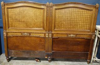 Appraisal: Neoclassical style headboard Neoclassical style headboard two twins mounted as