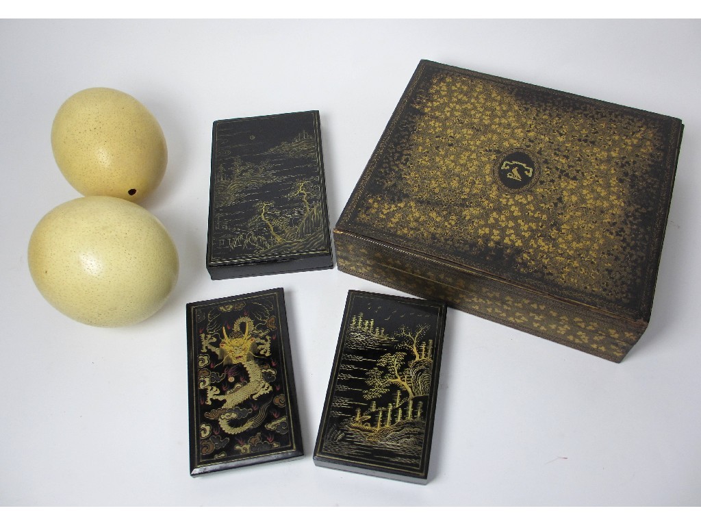 Appraisal: Three Chinese black and gold lacquered rectangular boxes decorated with