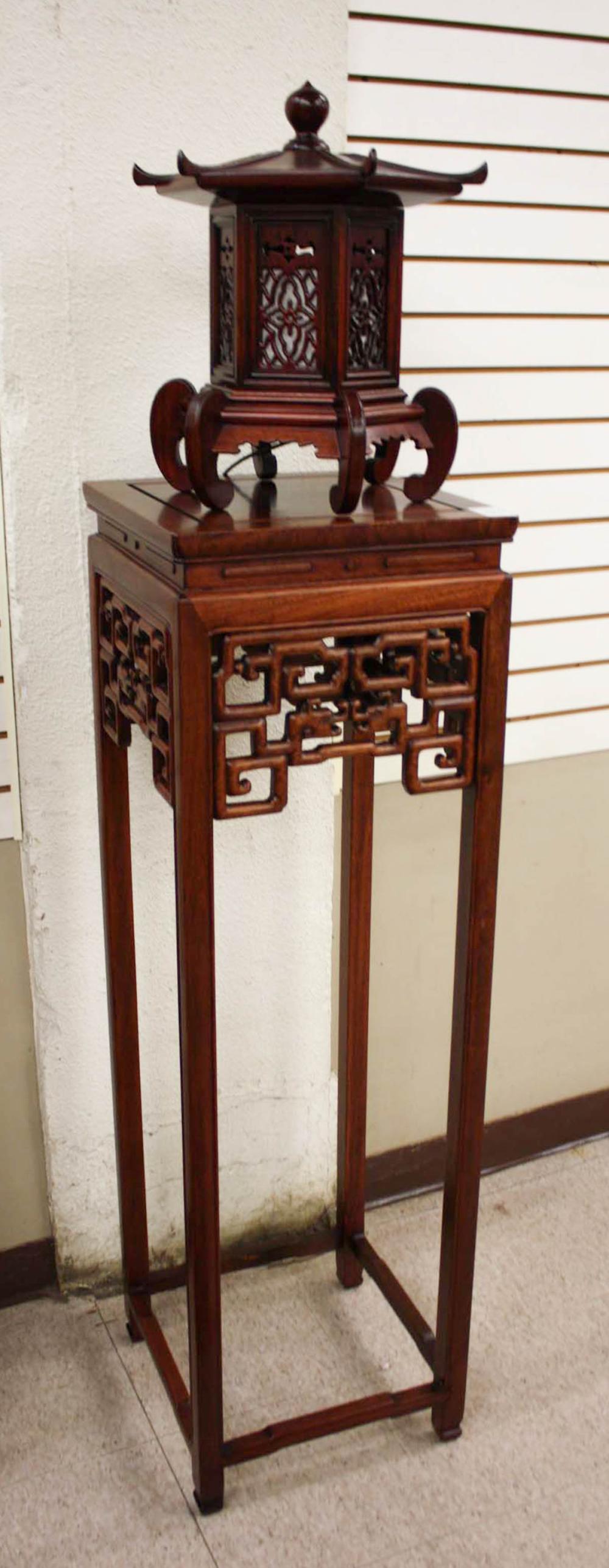 Appraisal: CHINESE ROSEWOOD LANTERN AND PEDESTAL TABLE an electric pagoda lantern