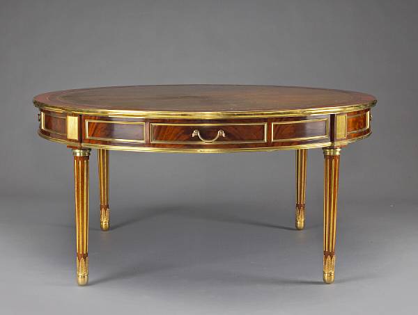 Appraisal: A Louis XVI style gilt bronze and brass mounted mahogany