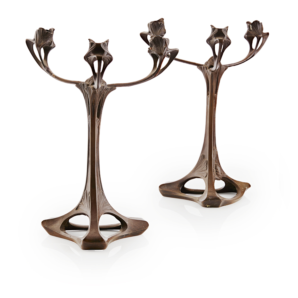 Appraisal: MANNER OF PAUL FOLLOT PAIR OF ART NOUVEAU BRONZE CANDELABRA