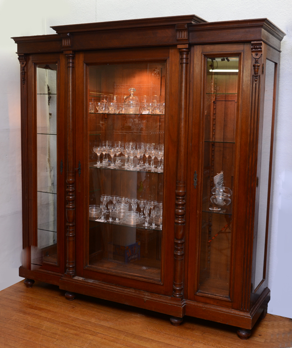 Appraisal: VICTORIAN WALNUT DISPLAY CABINET Architectural pediment walnut case with half