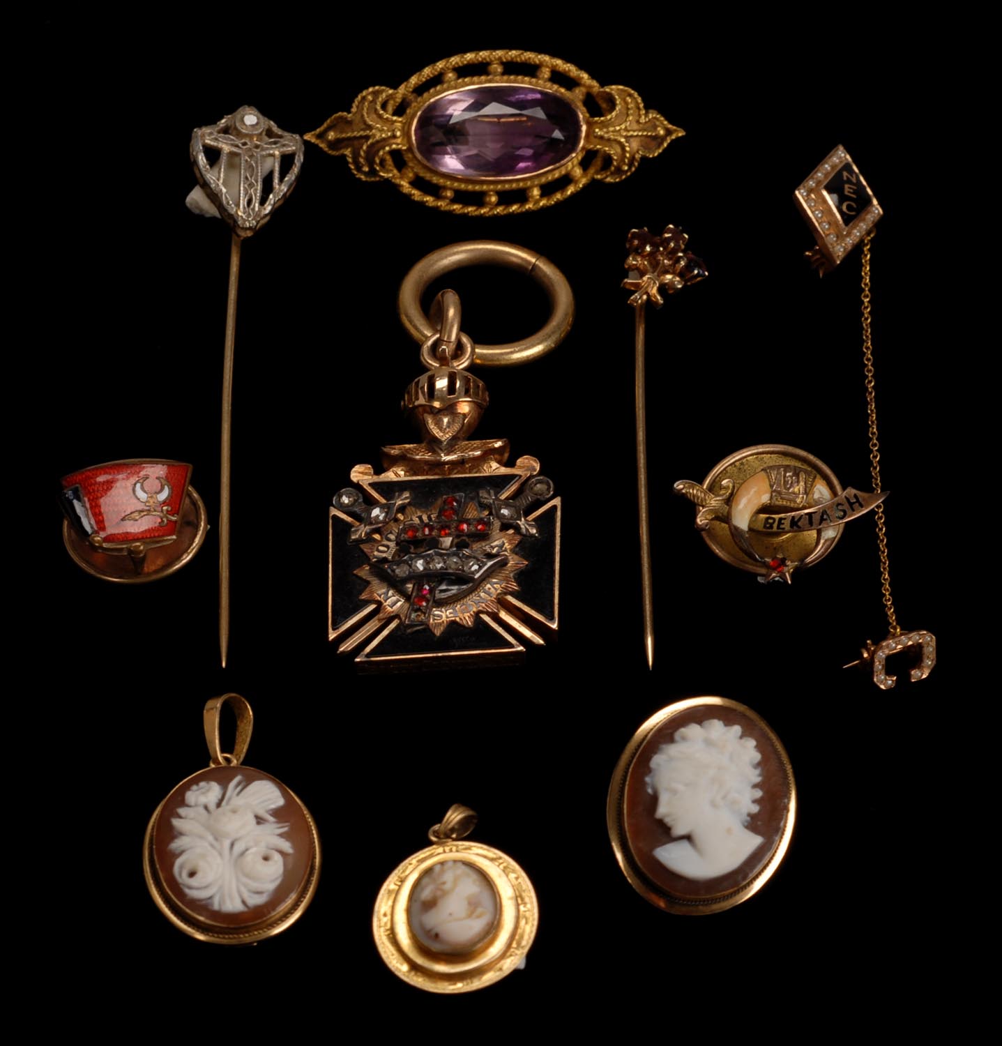 Appraisal: TEN PIECES OF JEWELRY three cameo brooches amethyst and gold