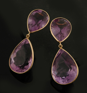 Appraisal: A pair of amethyst drop earrings The double pear shaped