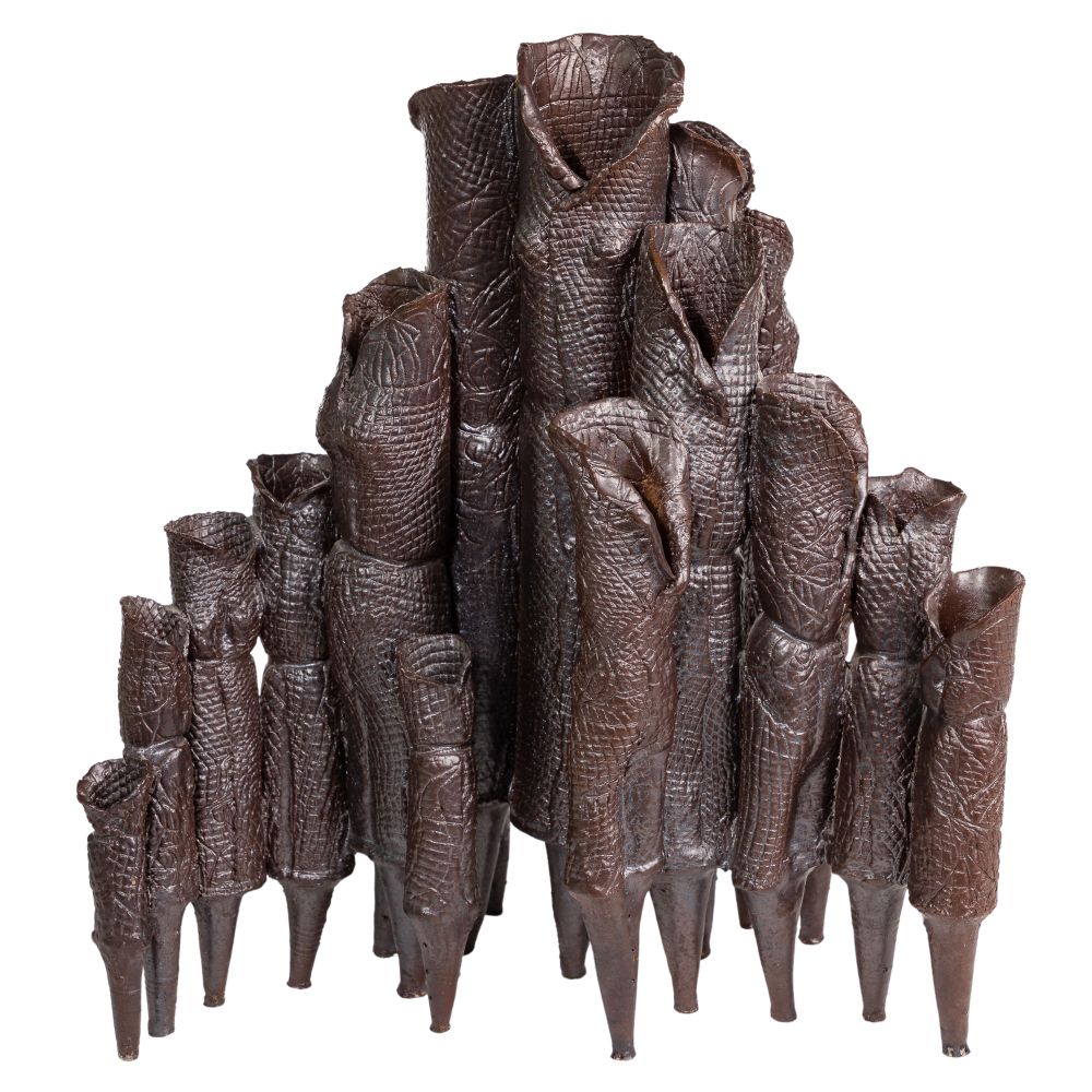 Appraisal: ABSTRACT SCULPTUREUndated unsigned embossed metal cylinders having pointed bottoms