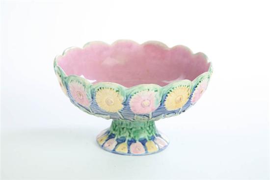 Appraisal: MAJOLICA COMPOTE Scalloped rim with amethyst interior and alternating pink