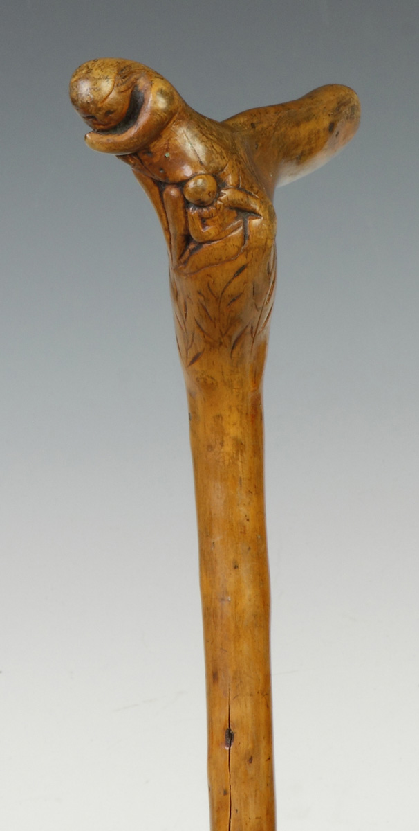 Appraisal: Carved Wood Canes w Figures th cent