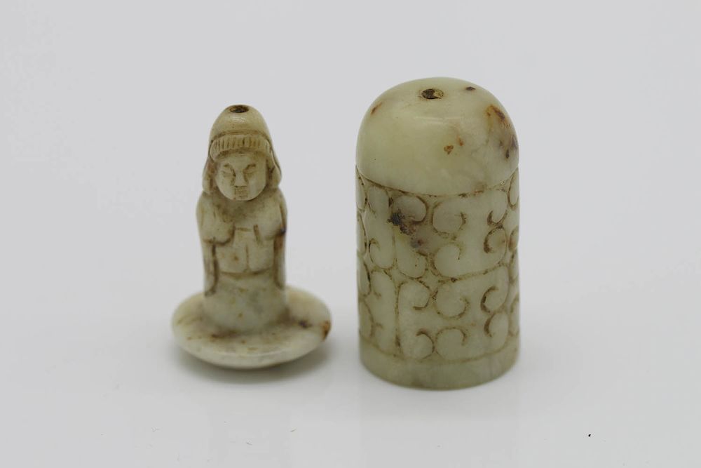 Appraisal: CHINESE WHITE JADE HIDDEN BUDDHA BEAD PENDANT MING The pendant