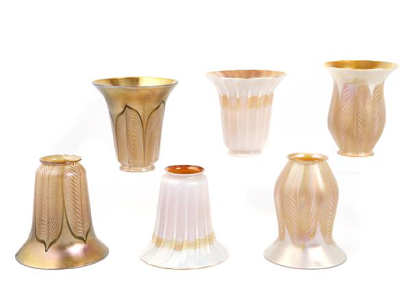 Appraisal: A group of six Quezal decorated art glass shades early