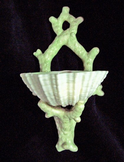 Appraisal: A Belleek wall vase in the form of a white