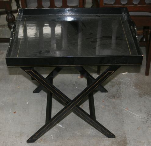 Appraisal: A black lacquered butler's tray on folding stand