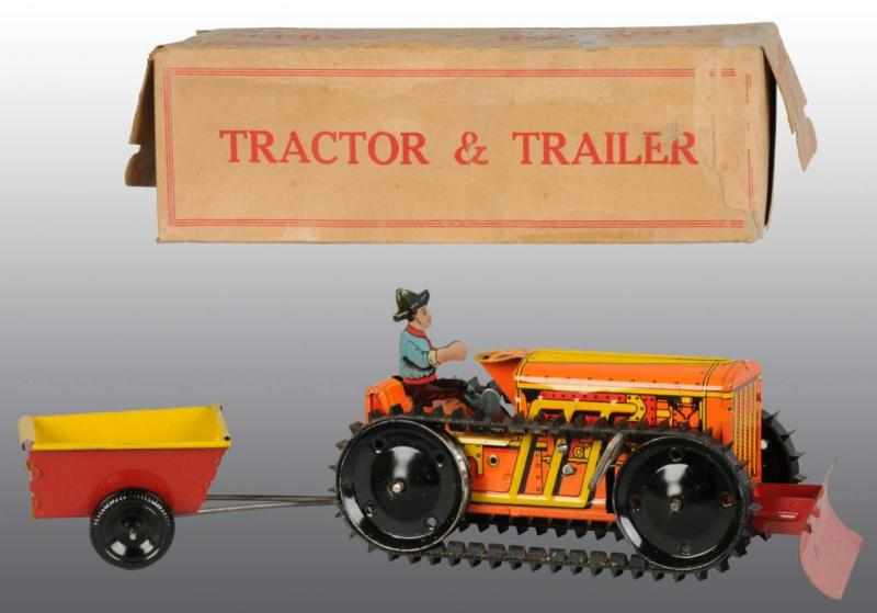 Appraisal: Tin Marx Tractor Trailer Wind-Up Toy Description American Original treads