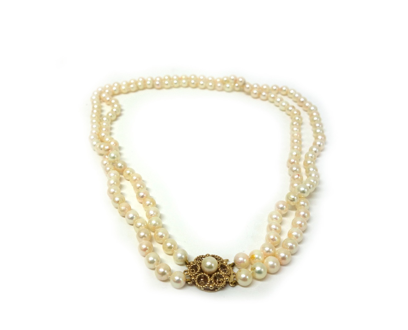 Appraisal: A two row cultured pearl necklace on ct gold circular