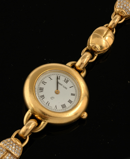 Appraisal: A Ladies gold scarab wristwatch by Robert Clerc Recent Quartz