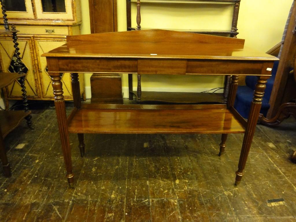 Appraisal: A th century mahogany two tier buffet or serving table