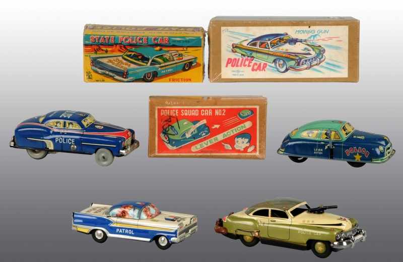 Appraisal: Lot of Tin Litho Police Car Friction Toys Description Japanese