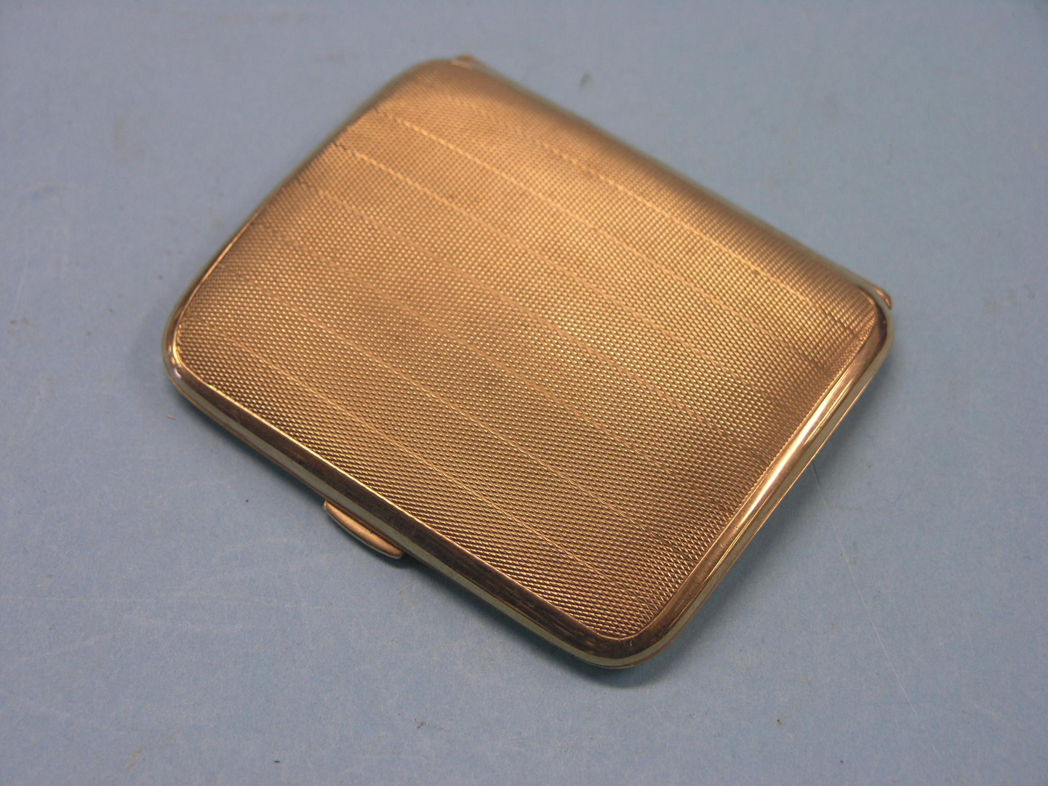 Appraisal: An engine-turned ct gold cigarette case London grams