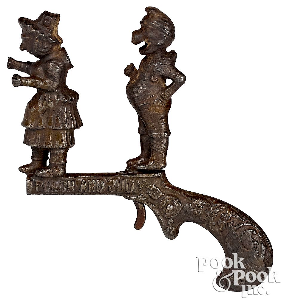 Appraisal: Ives cast iron animated Punch and Judy cap gun Ives