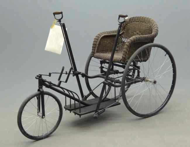 Appraisal: C Invalid tricycle with wicker seat Includes bell Rideable