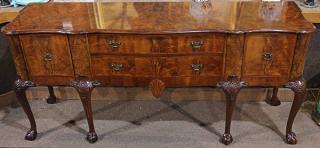 Appraisal: English mahogany sideboard early th century having a shaped top