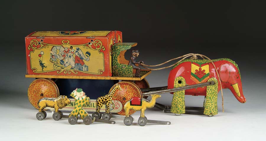 Appraisal: BARNUM BAILEY CIRCUS PARADE Circa 's Tin wind-up circus wagon