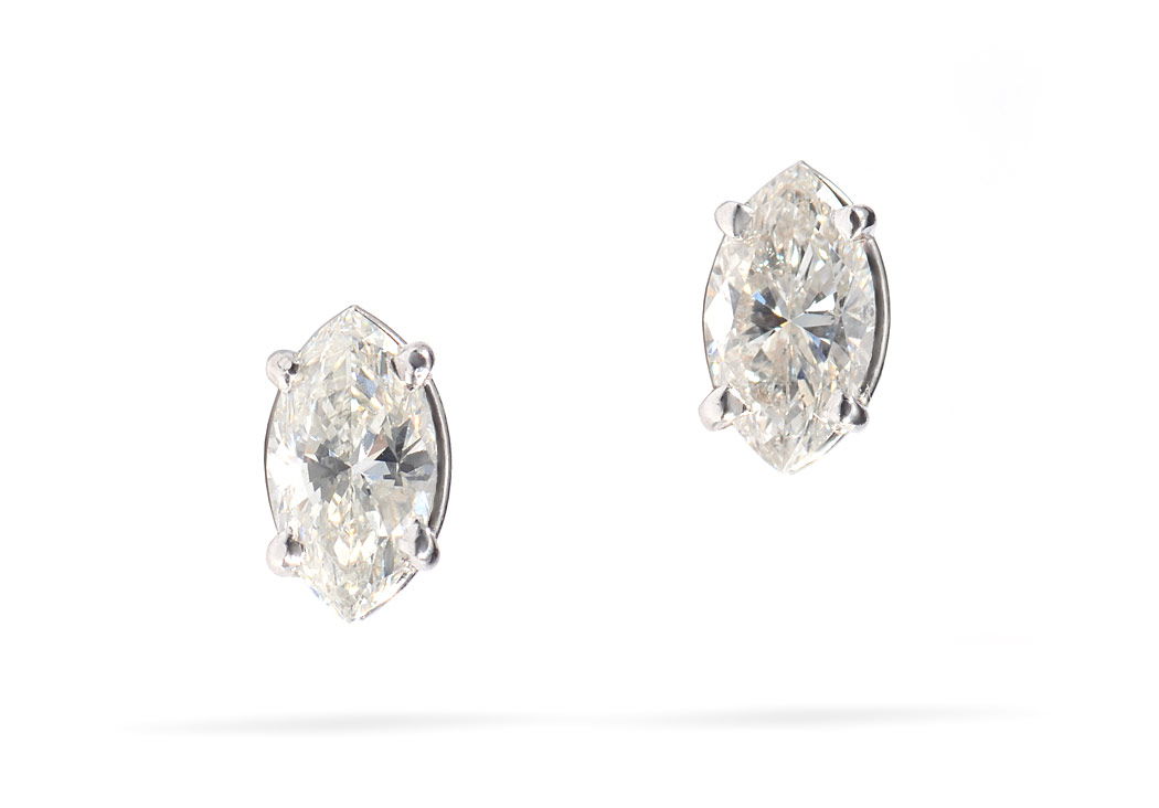 Appraisal: MARQUISE DIAMOND SOLITAIRE EARRINGS K white gold earrings with two