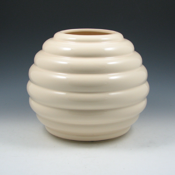 Appraisal: McCoy Roseville Floraline Freeform Art Deco vase with horizontal ribs