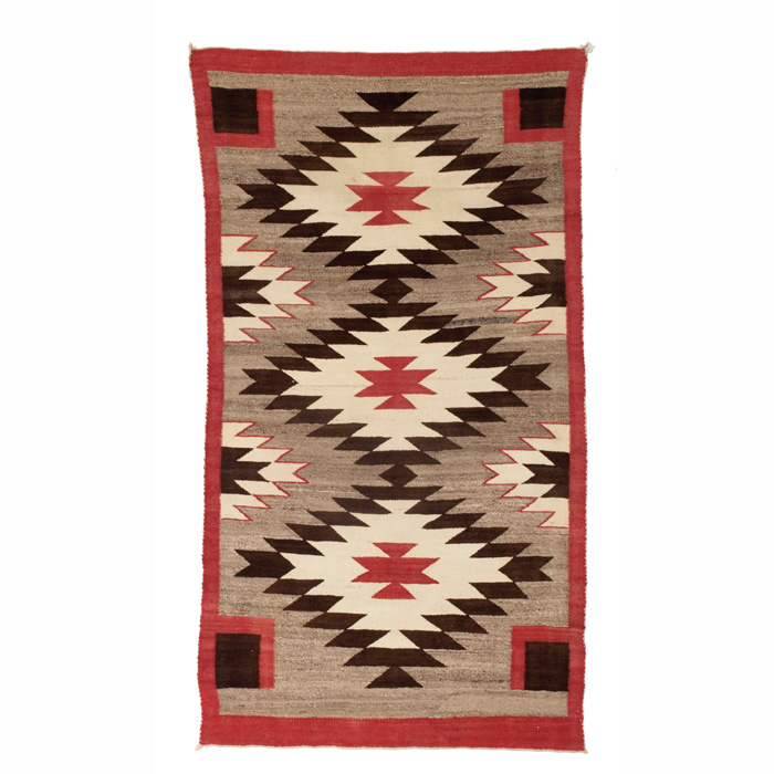 Appraisal: Navajo rug c diamond pattern in red brown and cream