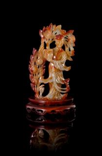 Appraisal: A Carved Agate Figure of a Meiren A Carved Agate