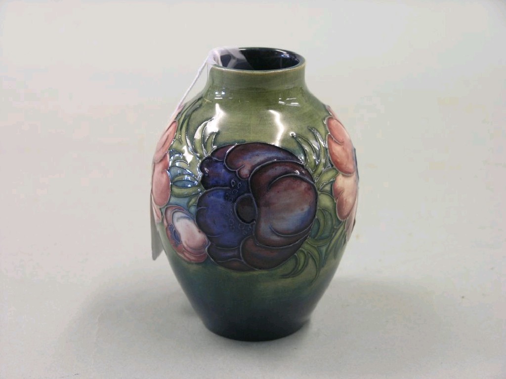 Appraisal: A Moorcroft vase ovoid shape painted with a coloured floral