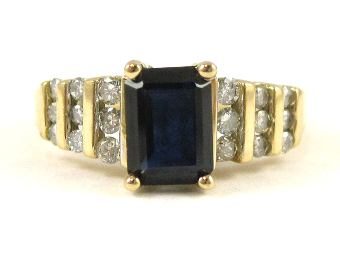 Appraisal: SAPPHIRE DIAMOND AND FOURTEEN KARAT GOLD RING with nine round-cut