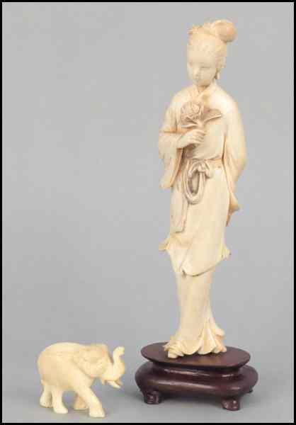 Appraisal: CARVED IVORY FIGURE HOLDING A FLOWER Together with a carved