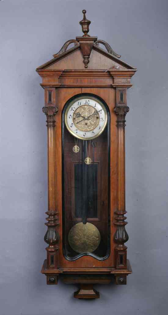 Appraisal: VICTORIAN WALL CLOCK Late th century Walnut Arched crest above