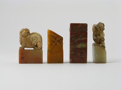 Appraisal: Four Chinese soapstone seals two carved with mythical beasts three