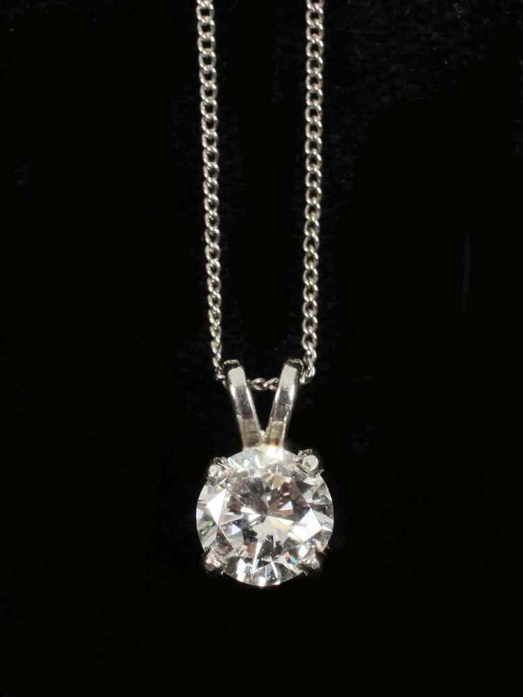 Appraisal: PENDANT - One platinum pendant with chain pendant is a