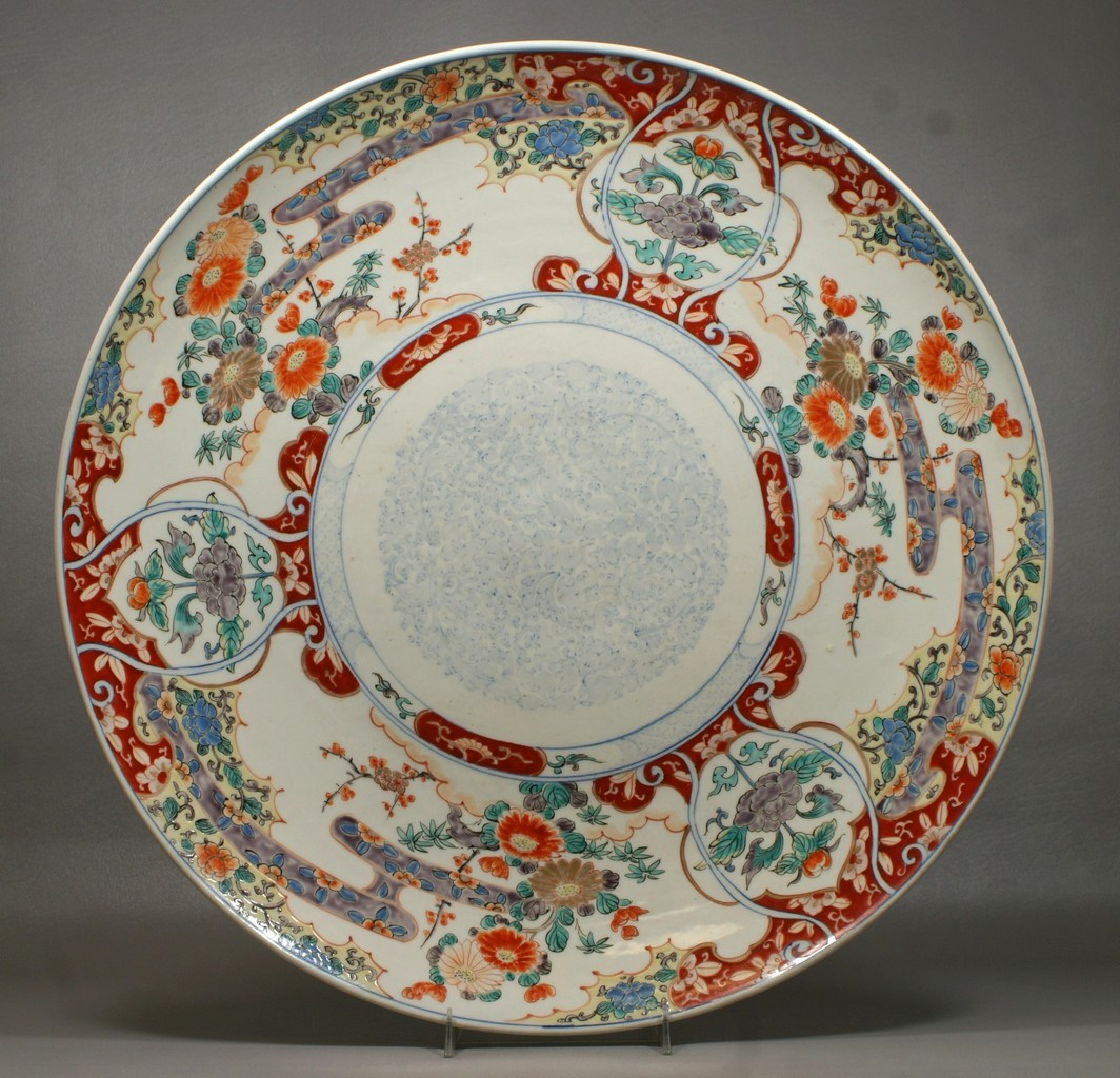 Appraisal: Imari porcelain charger pale blue center medallion overall floral design