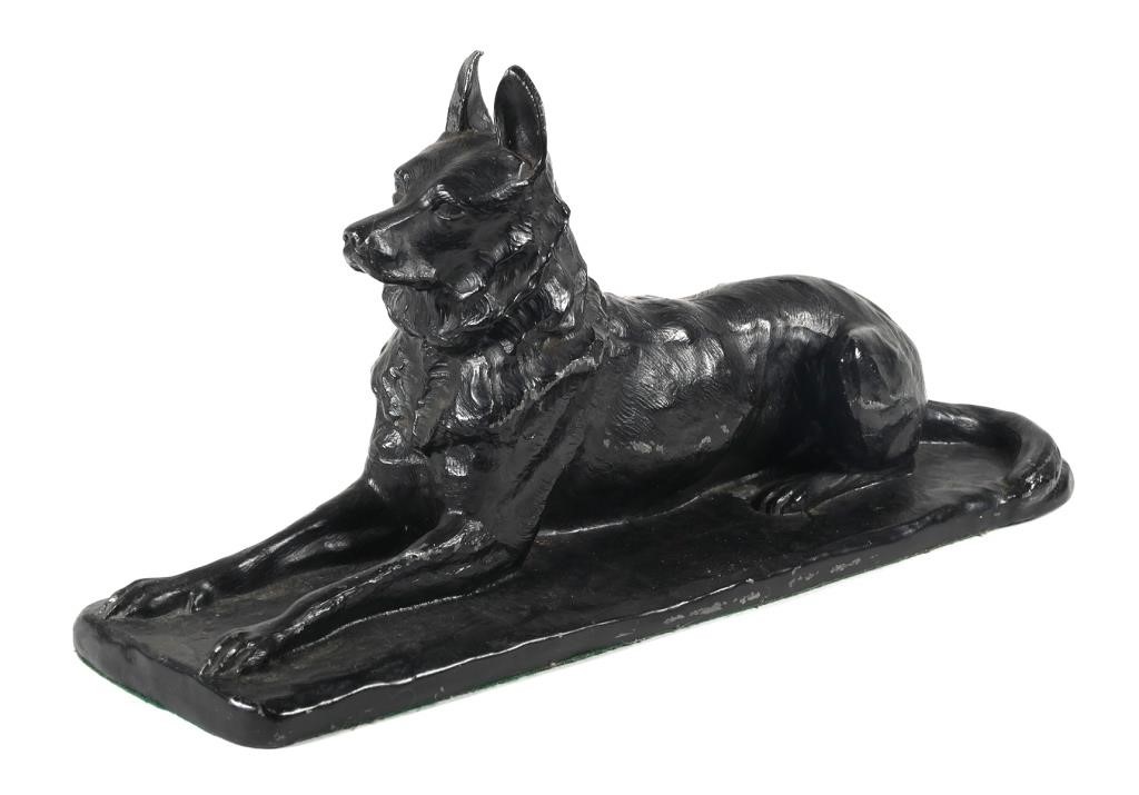 Appraisal: Mixed metal cast sculpture of a German Shepherd painted black