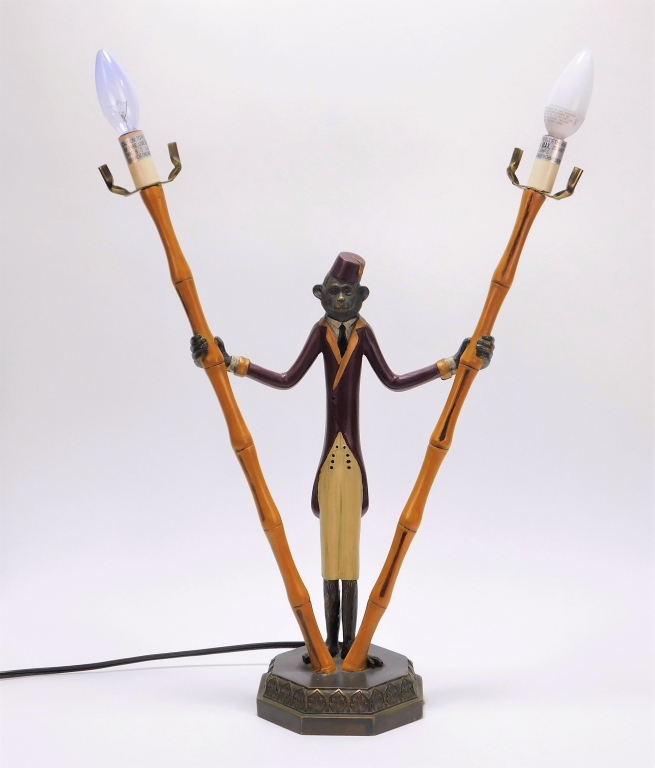 Appraisal: FIGURAL DOUBLE SCONCE MONKEY TABLE LAMP United States Early th