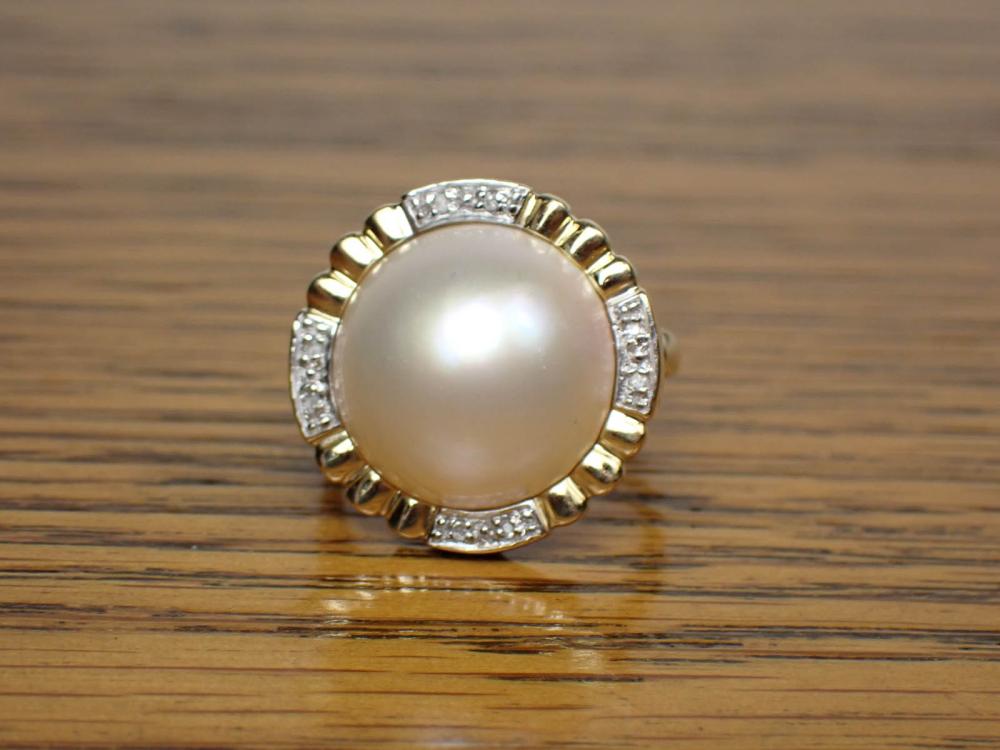 Appraisal: MABE PEARL DIAMOND AND FOURTEEN KARAT GOLD RING The k