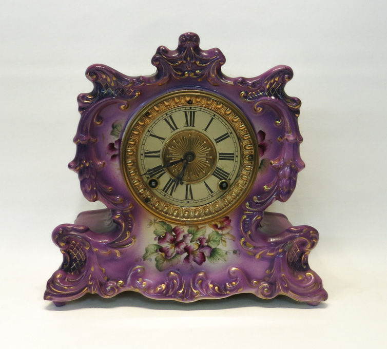 Appraisal: ANSONIA CHINA CASE MANTEL CLOCK Whisper model with lilac color