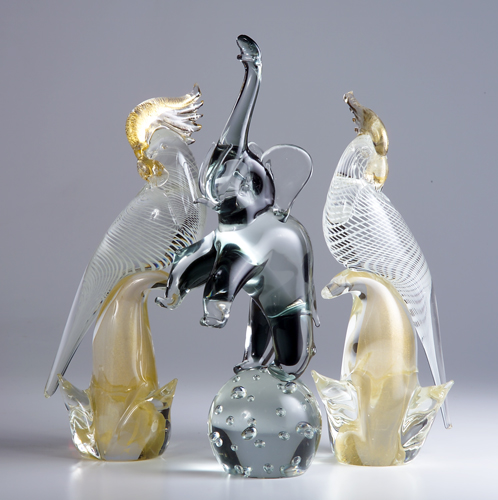 Appraisal: Pair of gold fleck glass birds and a glass elephant