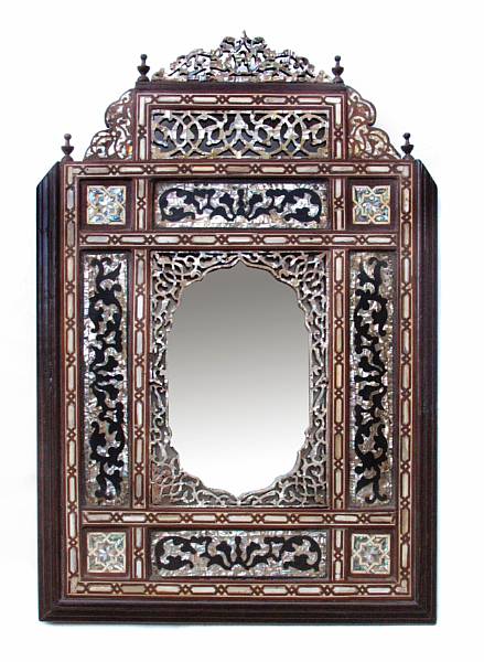 Appraisal: A Moorish style mother of pearl inlaid mirror height in