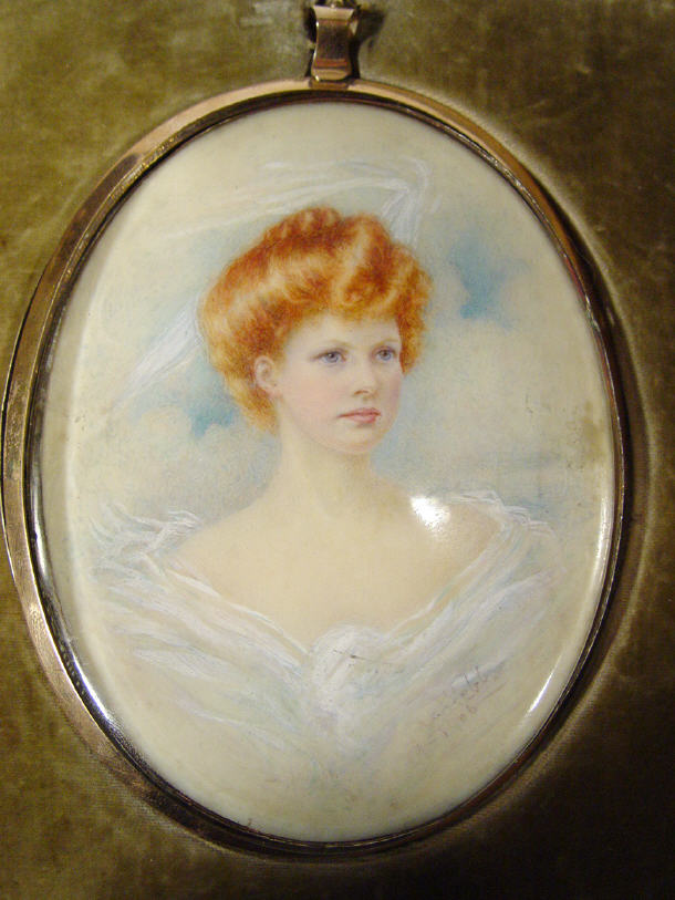 Appraisal: Oval Edwardian portrait miniature of a young woman before clouds