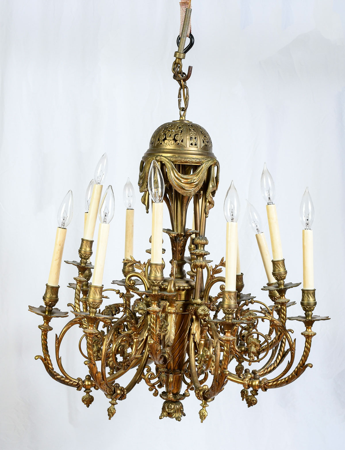 Appraisal: - LIGHT FRENCH BRASS CHANDELIER Having an overall scrolling foliate