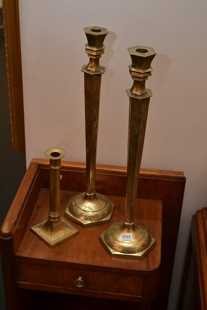 Appraisal: A PAIR OF BRASS CANDELABRA WITH A FLORAL PATTERN AND