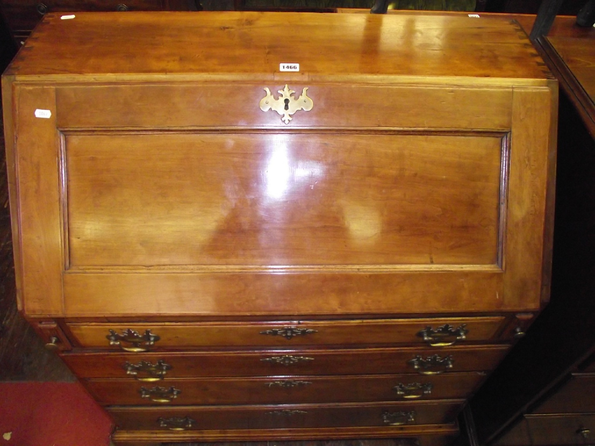 Appraisal: A George fruitwood countrymade bureau of four long graduated drawers