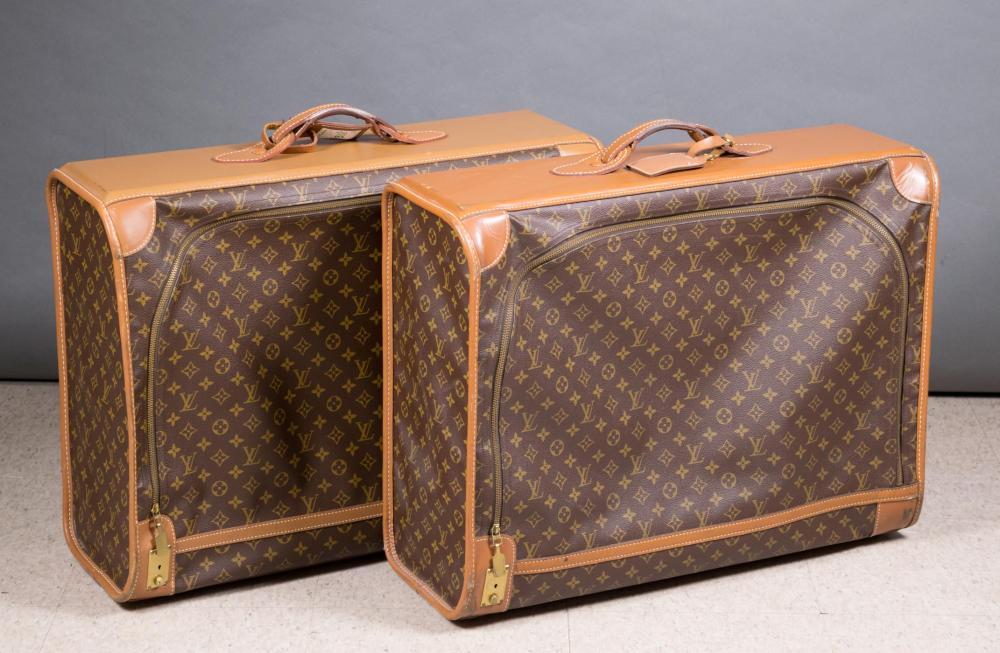 Appraisal: A PAIR OF LOUIS VUITTON SOFT-SIDE SUITCASES s monogrammed leather