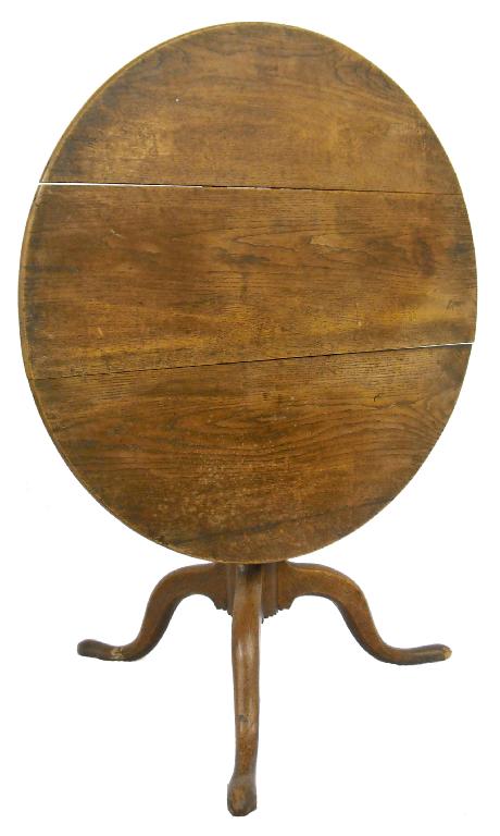 Appraisal: George III oak circular tilt-top tripod occasional table with a