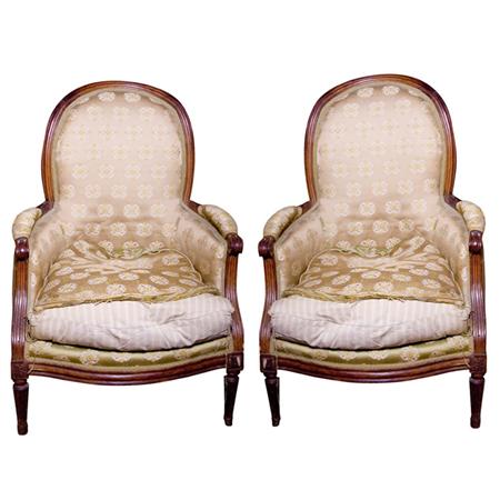 Appraisal: Companion Pair of Louis XVI Walnut Bergeres Estimate -